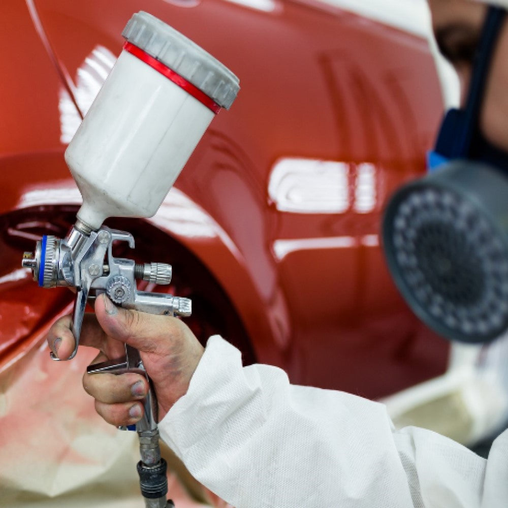 PISTOLA P/PINTAR GRAVEDAD HVLPVASO PLASTICO BOQUILLA 1.7MM MCA TRUPER